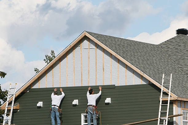 Professional Storm Damage Siding Repair technician working in Carteret, NJ